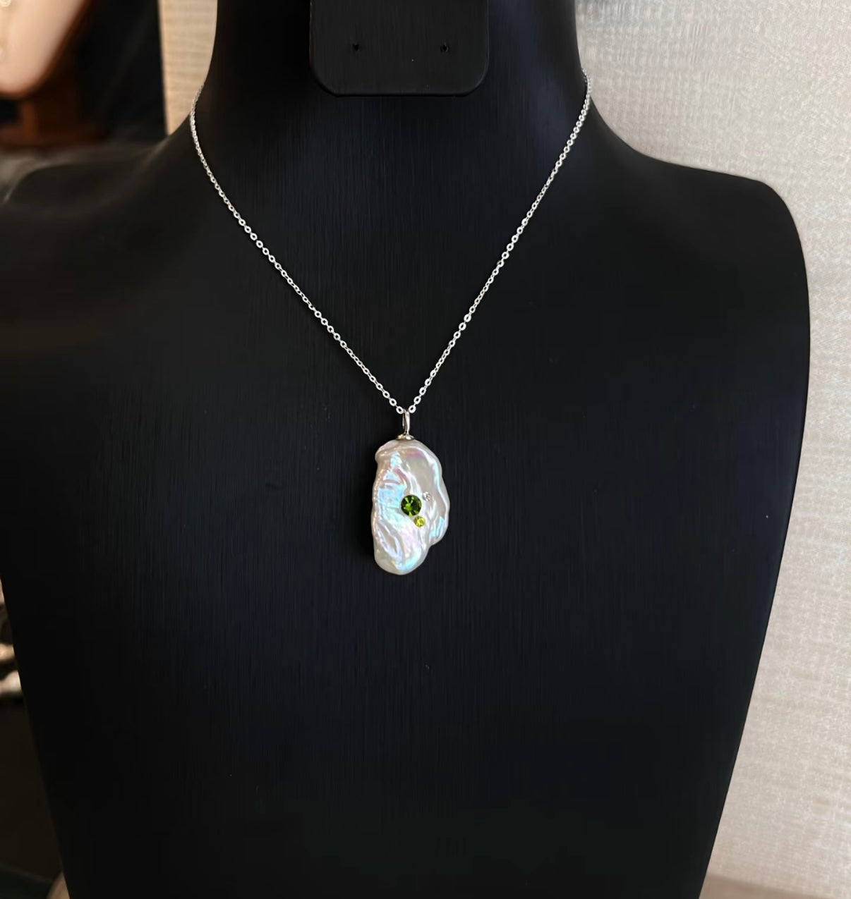 Each natural freshwater pearl baroque pendant is unique.