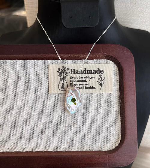 Each natural freshwater pearl baroque pendant is unique.